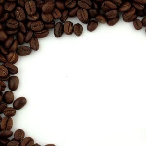 A white background with coffee beans in the middle.