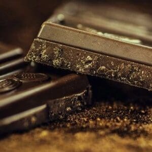 A close up of two pieces of chocolate